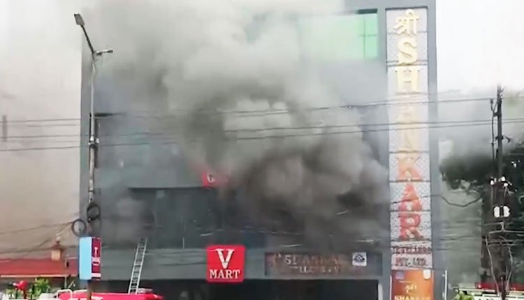 Significant Fire Erupts at Jharsuguda Mall; Firefighters Work to Control It